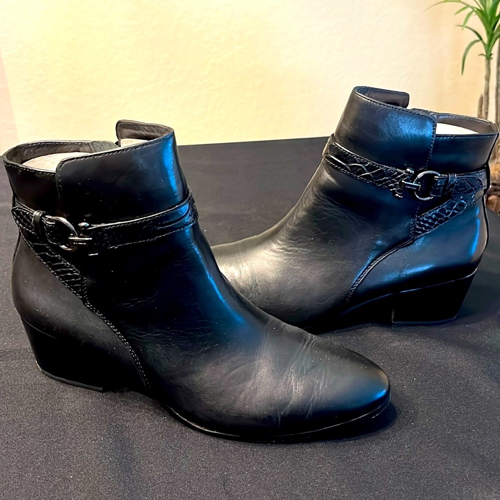 Coach chic and feminine moto style zip up leather bootie with ankle wrap straps